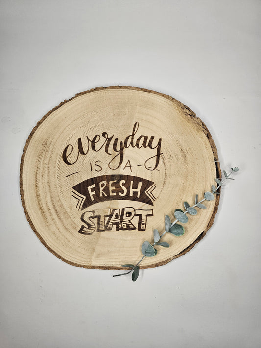 Holzscheibe mit Spruch