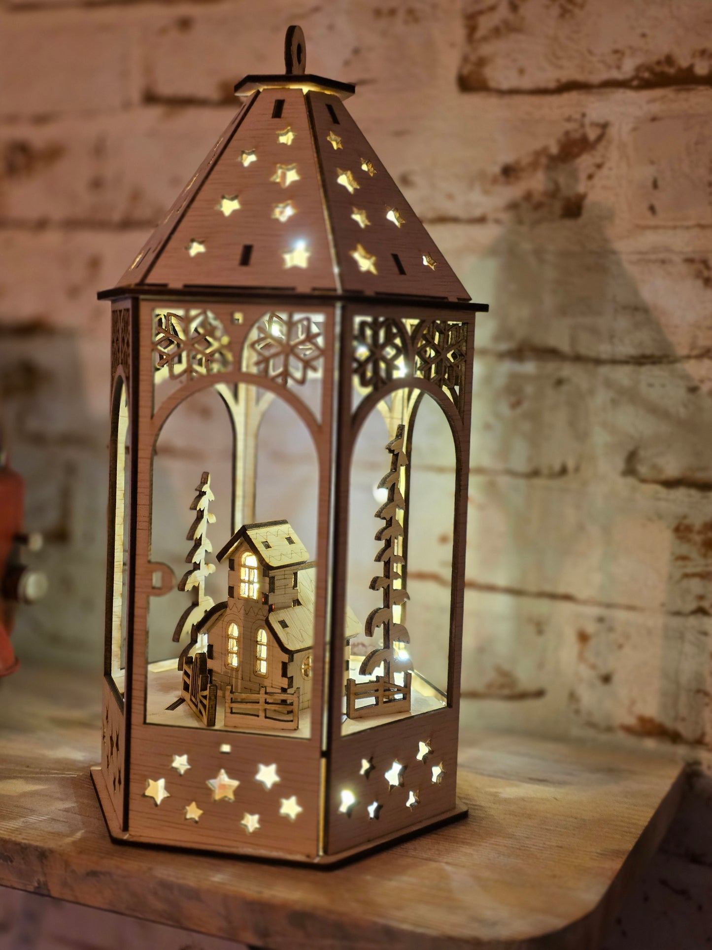 Laterne mit Wintermotiv